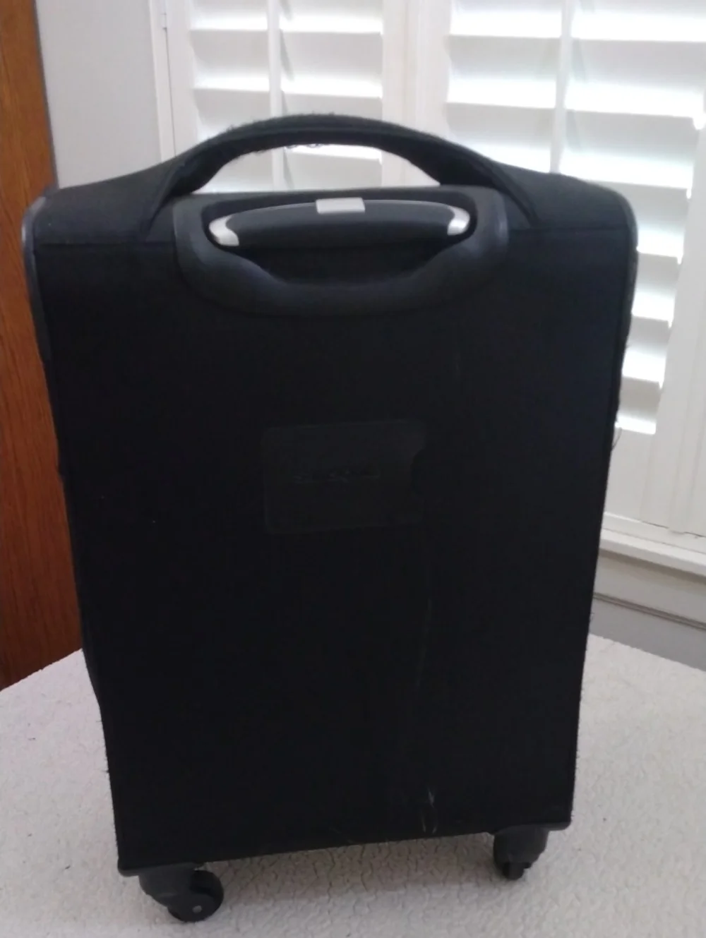 Samsonite Black Swivel Roller Carry On Suitcase